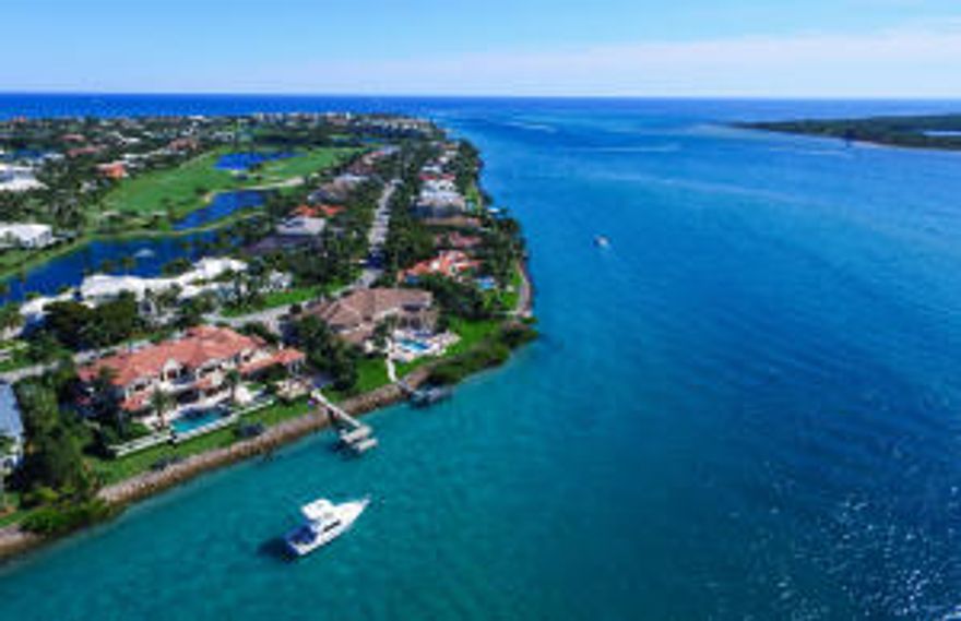 Located in the ocean to Intracoastal community of Sailfish Point. This CBS, impact glass home has 8,131 sq' under air and is set on 3/4 acre, wide water lot. There are 4 on suite bedrooms, 6 full baths, 3-1/2 baths. The home features: gourmet kitchen/pantry; great room; media room; office/library; wine cellar; art/fitness studio; 3 car & golf cart garage; infinity salt water pool, screened outdoor kitchen/wood fired oven; raised bed organic gardens, dock/lift and a full house home generator.