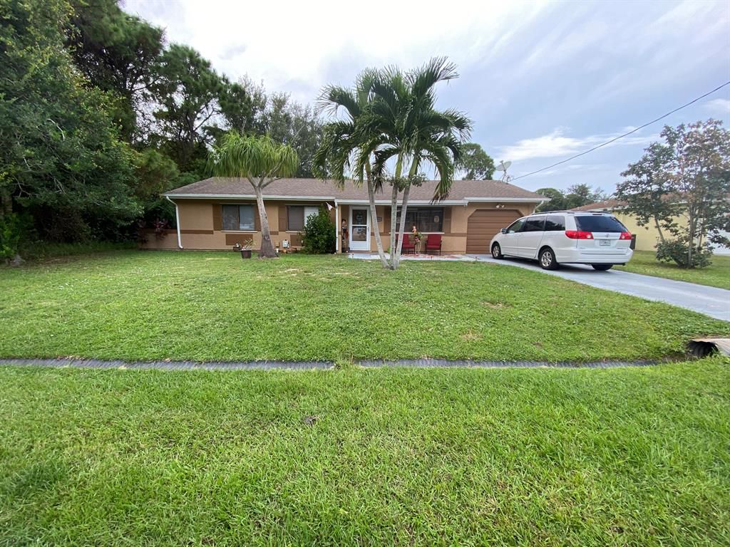 Photo of 2351 SE Mariola Avenue, Port Saint Lucie, FL 34952 (MLS # R10751280)