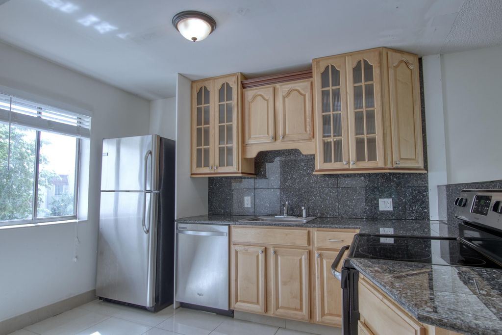 Photo of 4471 Luxemburg Court #301, Lake Worth, FL 33467 (MLS # B26009892)