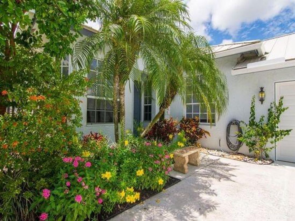 Photo of 9439 Poinciana Court, Fort Pierce, FL 34951 (MLS # R10798465)