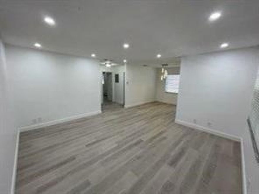 Wow!! Great Location, Great Neighbors, Gorgeous Modern Apartment with UPGRADED Kitchen and Bathrooms THIS IS A MUST SEE!! This SPACIOUS Apartment features Two Large Bedrooms & Two UPDATED Bathrooms, Master Bedroom has it's own Bathroom. The Large kitchen is nicely upgraded with Granite Counter Tops, Stainless Steel Appliances and Beautiful Cabinets, with New Recessed Lighting, New Floors and Dishwasher and Washer & Dryer in the Unit, New Impact Windows. Two Parking Spaces. No Association Approval Required Apartment will be Available for immediate Occupancy. Application Fee $30 for everyone over 18 Minimum Credit Score of 630. Washer & Dryer in the Apartment. Only two month to move in. First month and one month Security Deposit.