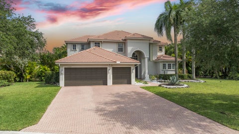 Photo of 10980 NW 69th Place, Parkland, FL 33076 (MLS # B26028216)
