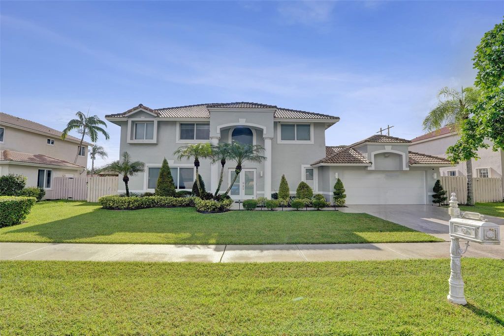 Photo of 930 Greenbriar Ave, Davie, FL 33325 (MLS # F10529700)