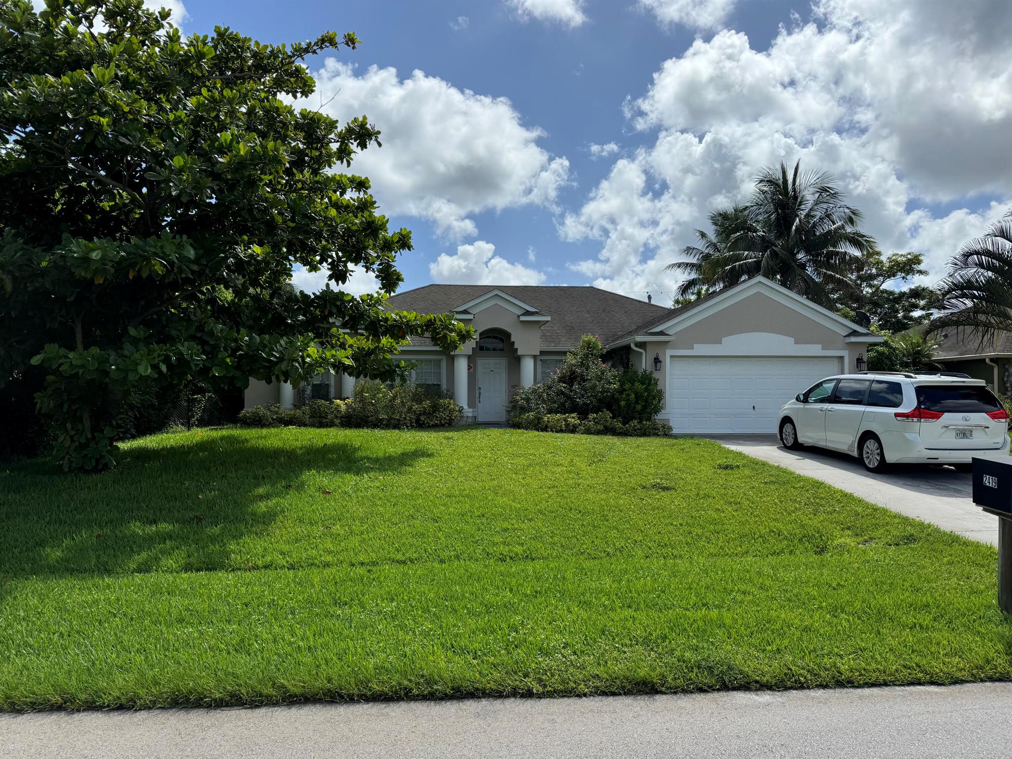 Well maintained home waiting for new owner. This four bedroom two bath home with two car garage features; spacious kitchen, formal living and dining area. Mature landscape with screened enclosed patio. Centrally located in the central part of City of PSL.