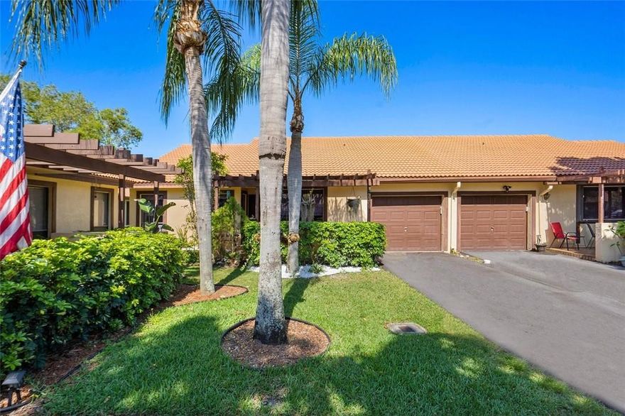 FINELY APPOINTED TRUE 3 BEDROOM PLUS OFFICE, REMODELED VILLA IN THE HEART OF TAMARAC! THIS METICULOUSLY MAINTAINED & MODERNIZED HOME WILL WOW YOU FROM THE OUTSIDE IN! LUSHLY LANDSCAPED, PRIVATE PATIO ENTRY, CORNER LOT, THIS RESIDENCE IS NOTHING SHORT OF SPECTACULAR! TOP OF THE LINE WOOD FLOORING THROUGHOUT! ABUNDANT UPGRADES IN KITCHEN INCLUDE A COFFEE BAR & HIGH END STAINLESS STEEL APPLIANCES. LIGHT, BRIGHT NEUTRAL COLORS. THREE SPACIOUS BEDROOMS & OPEN FLOOR PLAN ENABLE ENDLESS ENTERTAINMENT OPPORTUNITIES. PRISTINE PRIDE OF OWNERSHIP! COMMUNITY AMENITIES: TENNIS, PICKLEBALL, POOL & CLUBHOUSE. LOW MONTHLY FEES INCLUDE ROOF REPAIRS & ROOF REPLACEMENT!! LOOK NO FURTHER FOR YOUR PERSONAL TROPICAL OASIS! CLOSE TO GOOD SCHOOLS, HOSPITAL, FINE DINING, SHOPS & MORE! ALL AGES & PETS WELCOME.