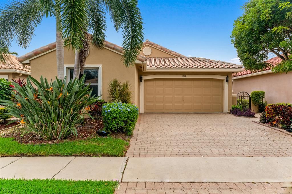 Photo of 7162 Whitfield Avenue, Boynton Beach, FL 33437 (MLS # R10744464)