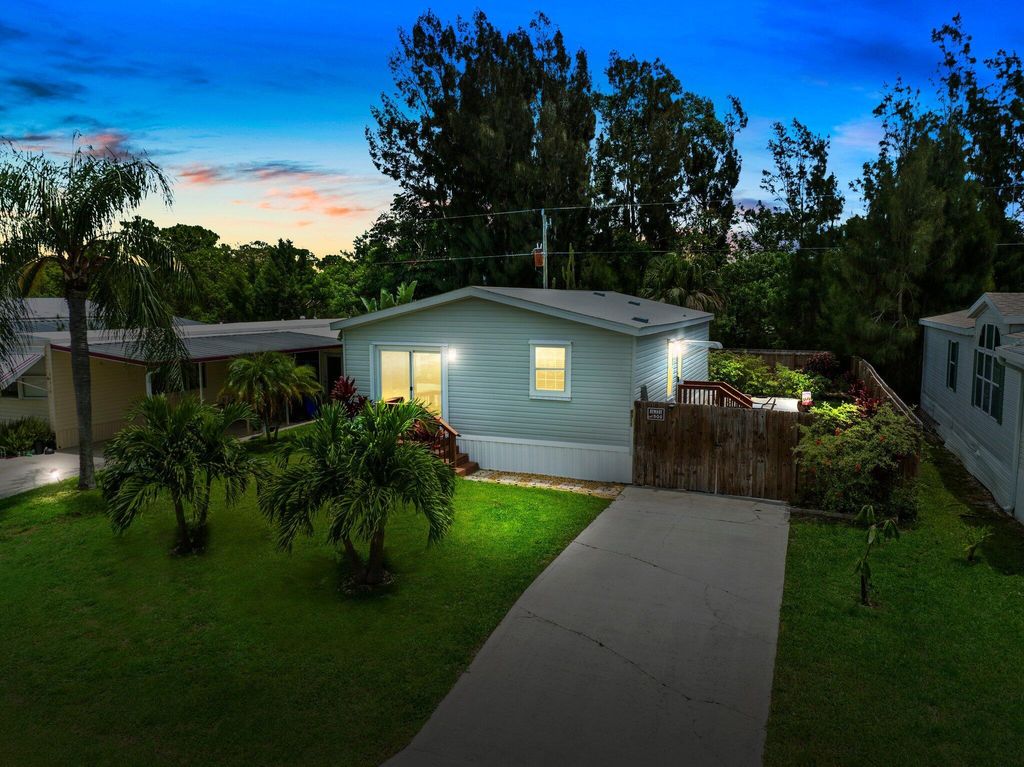 Photo of 8011 SE Skylark Avenue, Hobe Sound, FL 33455 (MLS # R10906808)