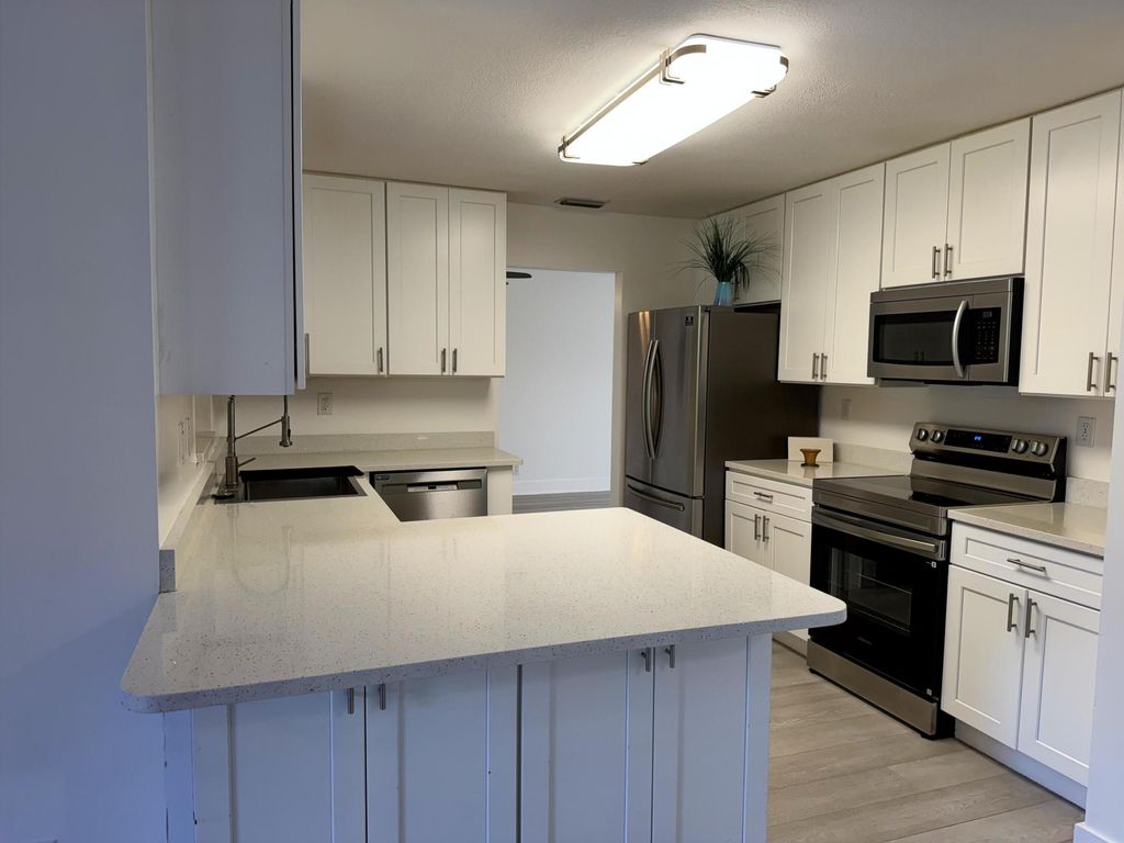 Photo of 221 Bilbao Street, Royal Palm Beach, FL 33411 (MLS # R11165058)