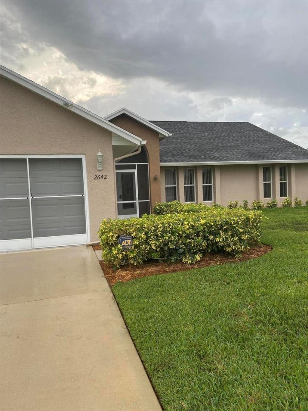 Photo of 2642 SW Monterrey Lane, Port Saint Lucie, FL 34953 (MLS # R10758734)