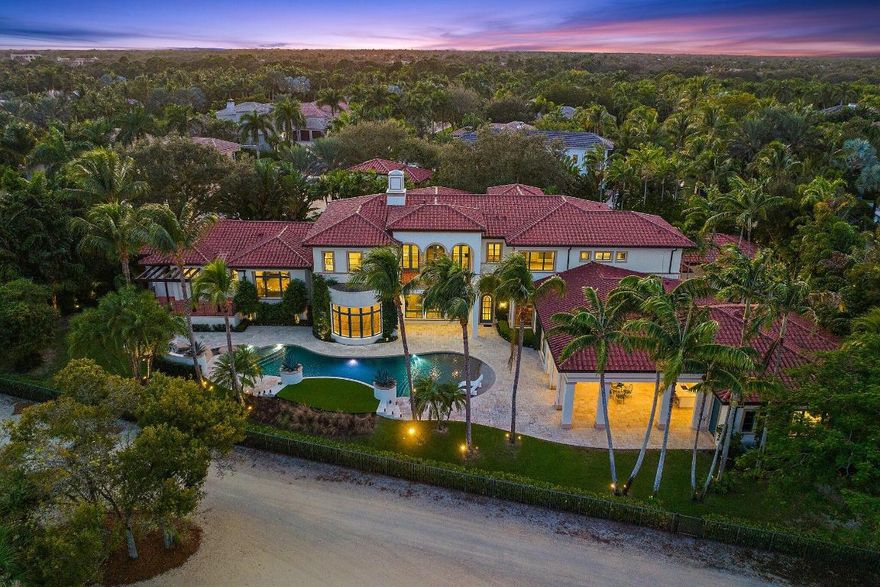 View, View, View! This estate boasts the finest view in Old Palm, with a wide open vista, and looking up the ninth fairway, to the newly renovated clubhouse. There are amazing golf course views from every room of the house and beautiful ocean breezes into the backyard. Located behind a private gate, on .84 acre lot at the end of a quiet cul-de-sac street, you have complete privacy. The estate has been thoroughly renovated inside and out, some highlights include all new French Oak floors, light fixtures, bathrooms, security system with exterior cameras, whole house entertainment system, home automation by Savant, landscaping, exterior lighting system and fixtures, stucco and paint, pool equipment, pool resurfacing, and phantom screens for the loggia. This is an entertainer's dream with a kitchen that has four ovens, three dishwashers, warming drawer, two beverage drawers, a 60" Wolf stove, Subzero fridge/freezer and a butlers pantry, as well as a breakfast room and family room off of the kitchen. There is plenty of space for privacy with the master suite on the lower level along with V.I.P. guest suite, living and dining rooms, wet bar, his & her offices, club room, gym, theatre, and laundry room. Take the elevator to the second level which boasts four more bedrooms, two en suite and one Jack & Jill, along with a loft area and a second laundry room. Another bonus is the casita which has two separate en suite bedrooms with full closets and a kitchenette. Some other features of the estate include, a commercial full house Generac generator, triple firewalls, a Cuno whole house water filtration system, a putting green and multiple fountains. This ultra-luxury estate is simply "the best of the best" in this exclusive golf course community!