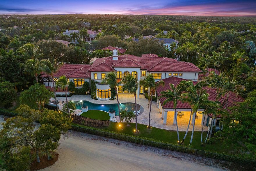 View, View, View! This estate boasts the finest view in Old Palm, with a wide open vista, and looking up the ninth fairway, to the newly renovated clubhouse. There are amazing golf course views from every room of the house and beautiful ocean breezes into the backyard. Located behind a private gate, on .84 acre lot at the end of a quiet cul-de-sac street, you have complete privacy. The estate has been thoroughly renovated inside and out, some highlights include all new French Oak floors, light fixtures, bathrooms, security system with exterior cameras, whole house entertainment system, home automation by Savant, landscaping, exterior lighting system and fixtures, stucco and paint, pool equipment, pool resurfacing, and phantom screens for the loggia. This is an entertainer's dream with a kitchen that has four ovens, three dishwashers, warming drawer, two beverage drawers, a 60" Wolf stove, Subzero fridge/freezer and a butlers pantry, as well as a breakfast room and family room off of the kitchen. There is plenty of space for privacy with the master suite on the lower level along with V.I.P. guest suite, living and dining rooms, wet bar, his & her offices, club room, gym, theatre, and laundry room. Take the elevator to the second level which boasts four more bedrooms, two en suite and one Jack & Jill, along with a loft area and a second laundry room. Another bonus is the casita which has two separate en suite bedrooms with full closets and a kitchenette. Some other features of the estate include, a commercial full house Generac generator, triple firewalls, a Cuno whole house water filtration system, a putting green and multiple fountains. This ultra-luxury estate is simply "the best of the best" in this exclusive golf course community!