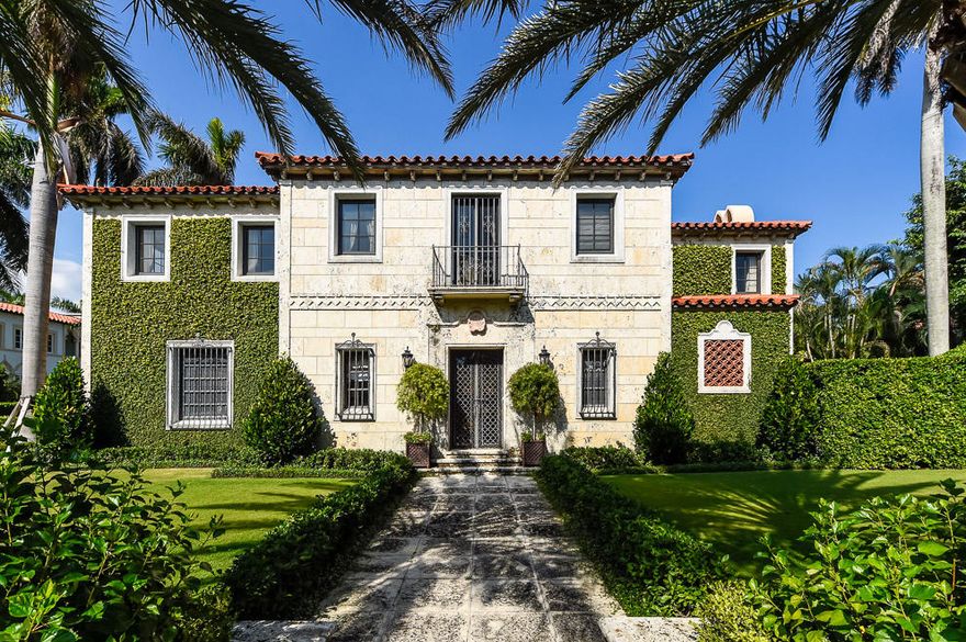 Extraordinary 1920’s Palm Beach estate with Intracoastal views. Beautifully renovated while preserving many original details including pecky cypress ceilings, doors, stone fireplaces, Cuban tiles and rare ironwork. Graciously situated on over ¾s of an acre, the newly landscaped property offers a private oasis surrounded by stunning grounds. This magnificent 6 bedroom/8 bath Mediterranean estate

features high ceilings, large living and dining rooms, gourmet kitchen, wood paneled library, separate pool house and private beach access. A rare find!