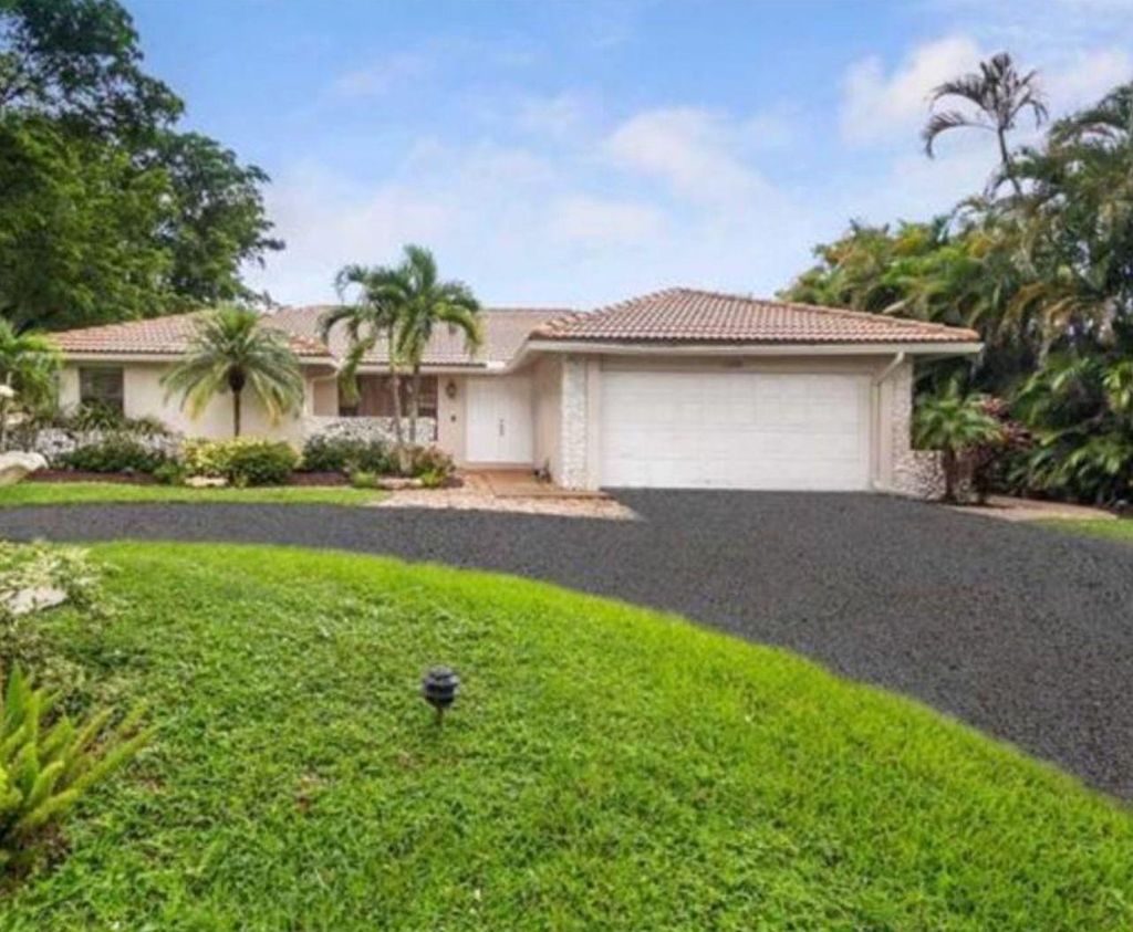 Photo of 11085 NW 15th St, Coral Springs, FL 33071 (MLS # F10481815)