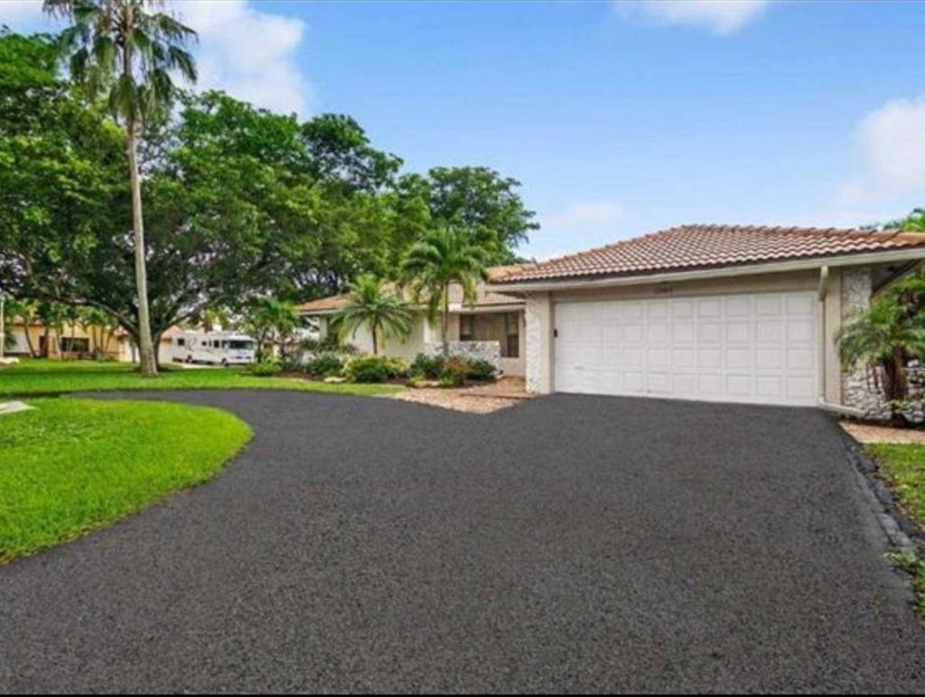 Photo of 11085 NW 15th St, Coral Springs, FL 33071 (MLS # F10481815)