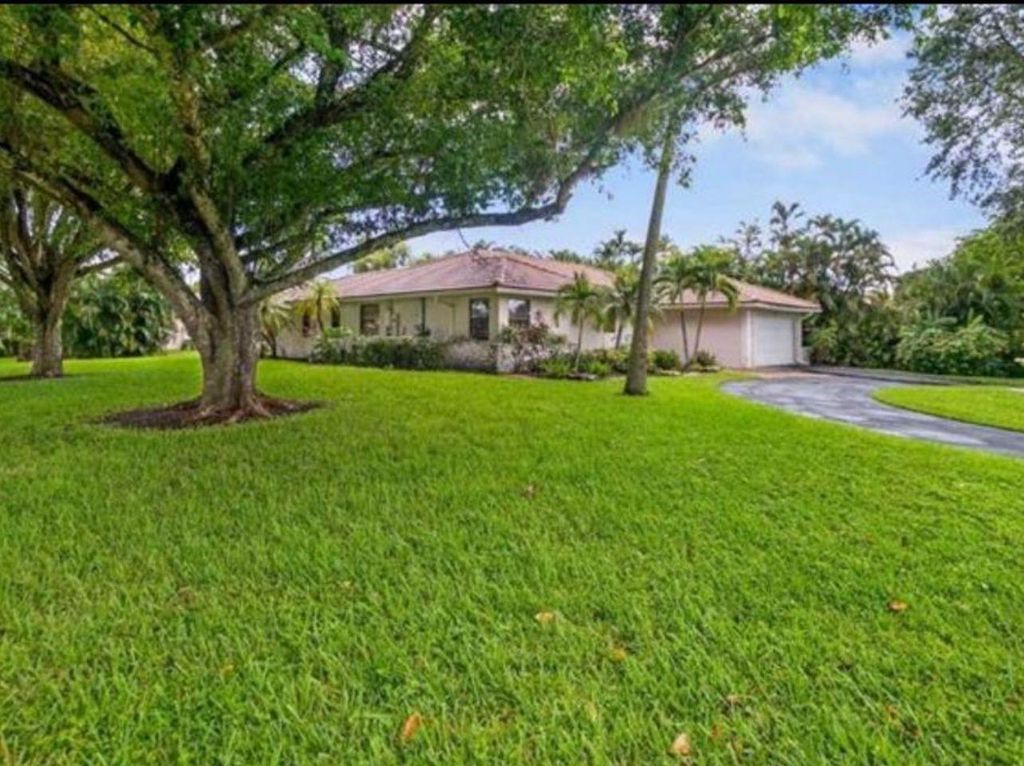Photo of 11085 NW 15th St, Coral Springs, FL 33071 (MLS # F10481815)