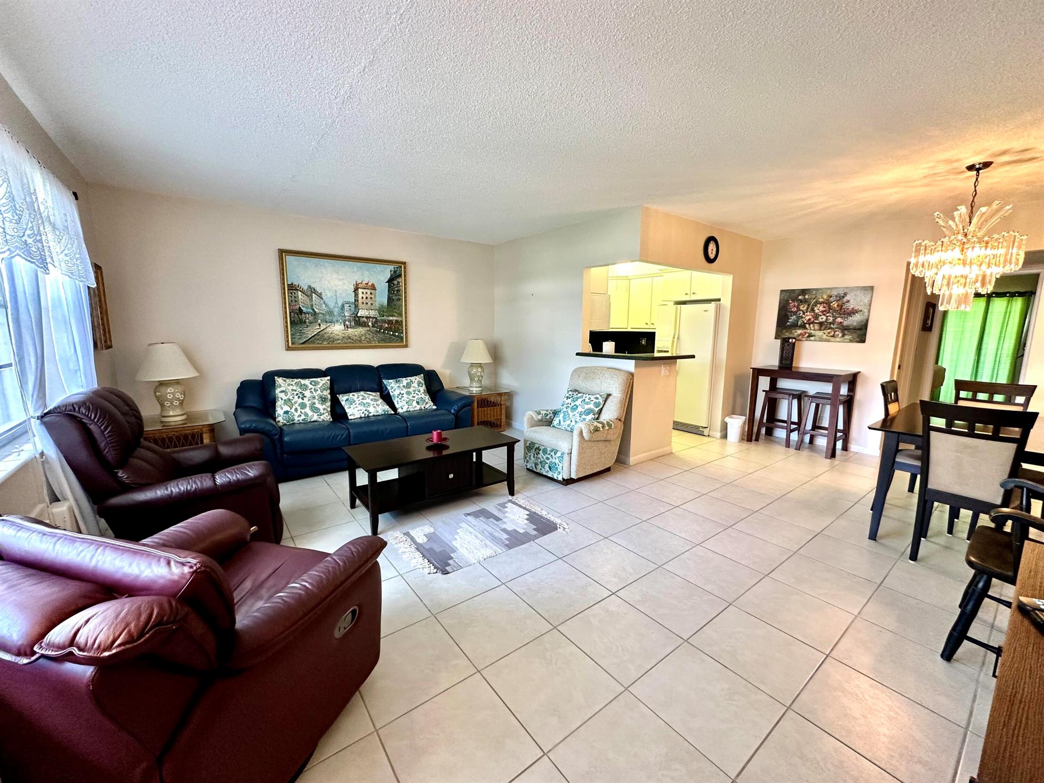 A 1 bed 1 bath apartment in a seniors community typically offers a cozy and functional living space for one or two individuals. The apartment may have a bedroom with a comfortable bed, a closet, and a window. The bathroom may include a shower, toilet, sink, and grab bars. The living area may include a small kitchenette, dining area, and living room with a sofa and TV. Seniors communities often provide communal dining, social activities, laundry facilities, transportation services, and emergency response systems to enhance quality of life.