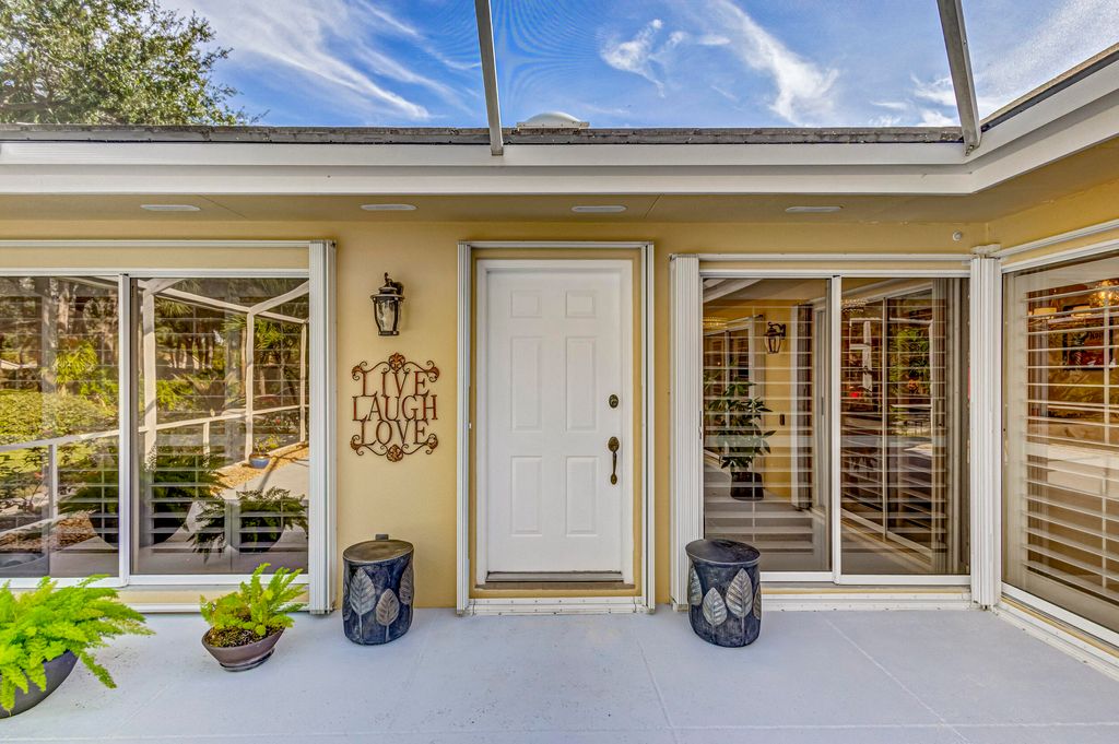 Photo of 5001 Lake Catherine Drive, Palm Beach Gardens, FL 33403 (MLS # R10941363)