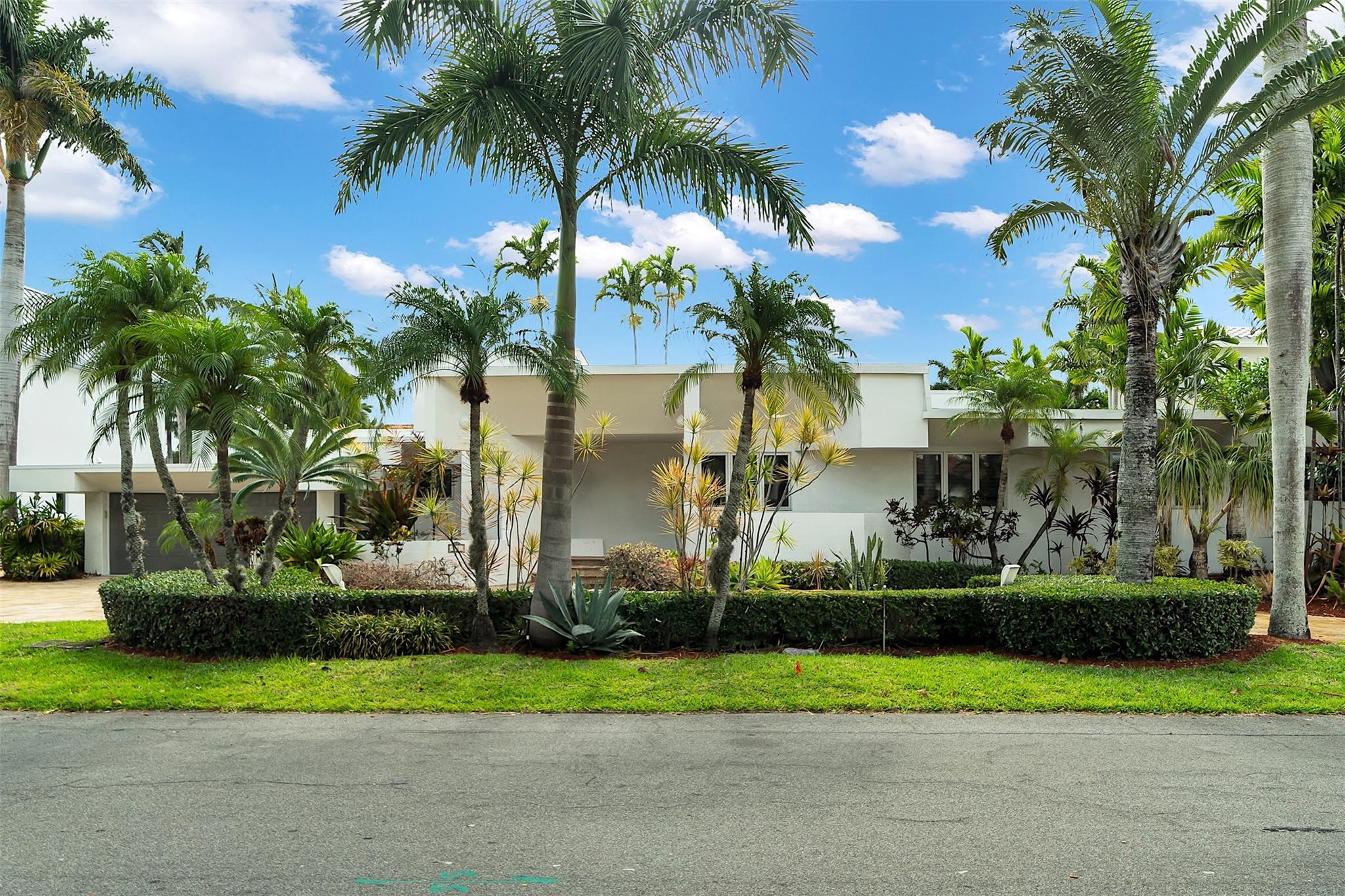 A GREAT FURNISHED HOME ON THE BEST STREET OF NURMI ISLES. WALK TO LAS OLAS BLVD AND THE OCEAN! ONE STORY WATERFRONT POOL HOME OFFERS LARGE OPEN FLOOR PLAN, HIGH CEILINGS AND NATURAL LIGHT, 4 BEDROOM 4.5 BATHS SPLIT PLAN, BEDROOMS EACH WITH ITS OWN BATH, WATERFRONT PRIMARY SUITE, FORMAL LIVING AND DINING ROOM, FAMILY ROOM, BAR, MARBLE FLOORS ON LIVING AREAS, HEATED POOL, SPA, COVERED PATIO WITH GAS BBQ GRILL LUSH LANDSCAPING, 2 CAR GARAGE, 110 FEET ON THE WATER, CONCRETE DOCK, 17K LB BOATLIFT. NEW FLAT ROOF, NEW BED/BATH FLOORS, VANITIES AND KITCHEN CABINETS, COUNTERTOPS, GARAGE AC, FRESHLY PAINT, MOST APPLIANCES. DOCK AND BOATLIFT RENTED SEPARATELY.