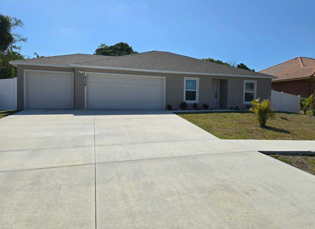 Photo of 4336 SW Yamada Drive, Port Saint Lucie, FL 34953 (MLS # R11076459)