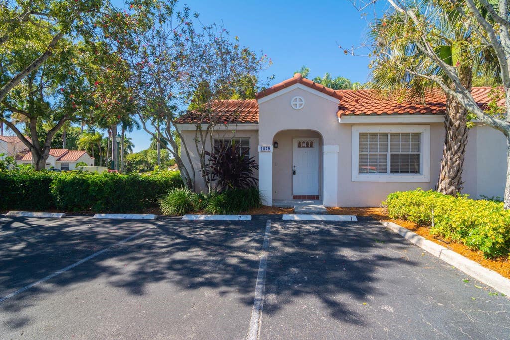 Photo of 1579 Springside Drive, Weston, FL 33326 (MLS # B26060626)