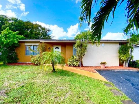 Photo of 406 SW 80th Ter, North Lauderdale, FL 33068 (MLS # F10533823) Photo of 406 SW 80th Ter, North Lauderdale, FL 33068 (MLS # F10533823)