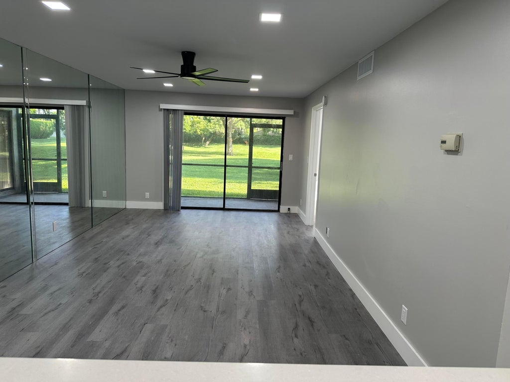 Photo of 3100 MILLWOOD Terrace #101, Boca Raton, FL 33431 (MLS # B26067495)