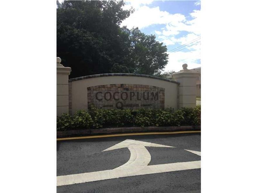 GORGEOUS TOWNHOUSE IN PRIVATE GATED COMMUNITY OF COCO PLUM THIS IS THE LARGEST MC REMODELED . SUPER CLEAN . TILE FIRST FLOOR, LAMINATE SECOND FLOOR. WASHER/DRYER IN UNIT. MINUTES FROM SEMINOLE HARDROCK AND THE BEACHES