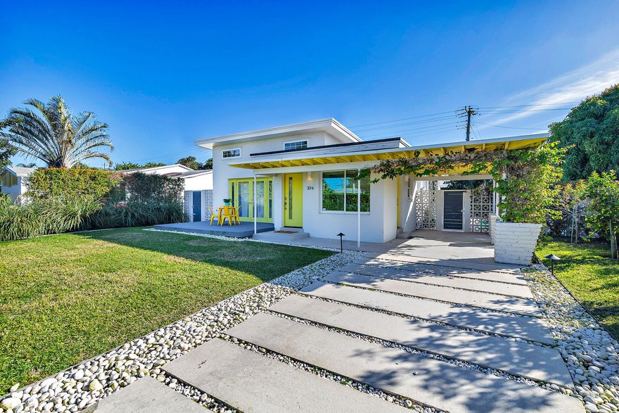 This stunning, professionally decorated 1950's home retains all its original mid-century modern character but has been updated throughout for a fully realized 21st century luxury living experience. Currently the home is a short-term rental as a highly successful VRBO rental or converted to a private SF home. The grounds have been redeveloped to maximize the outdoor living spaces with all-new landscaping, a remote-controlled heated pool and jacuzzi, a paved backyard, extra lighting, a pergola, a deck, driveway, CBS privacy enclosures and charming breeze block perimeter fences. Inside boasts the original high ceilings and the home comes with ample closet/ storage space(s). The home includes updated bathrooms, updated stainless steel appliances and granite countertops in the kitchen, new interior and exterior doors, a newer AC system, an alarm system and full impact rated windows. Perfectly situated in WPB's family friendly South End/ SOSO neighborhood, this home is close to I-95, PBI airport, Flagler Drive bike path, the Intracoastal Waterway, Worth Avenue shopping and some of the area's best restaurants. Also located in the South Olive Elementary School district which is now Pre-K through 6th grade and adding an additional grade per year for the next few years, eventually becoming a pre-K through 8th grade school on one campus.