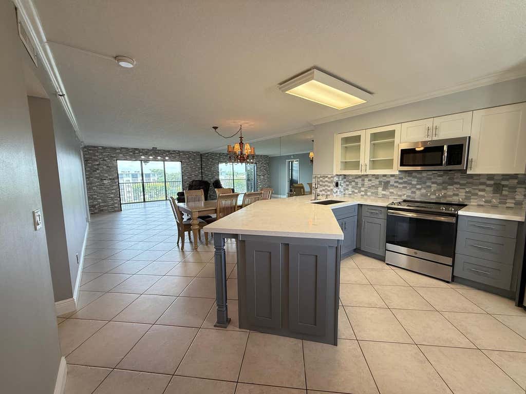Photo of 2215 CYPRESS ISLAND Drive #505, Pompano Beach, FL 33069 (MLS # B26060541)