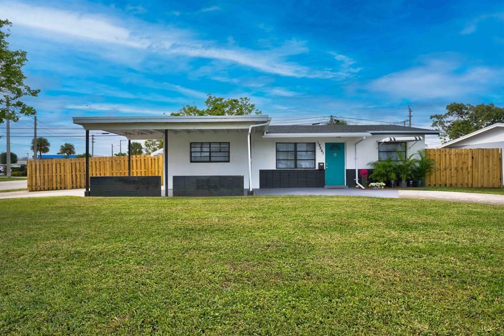 Photo of 12261 Acapulco Avenue, Palm Beach Gardens, FL 33410 (MLS # R10852691)