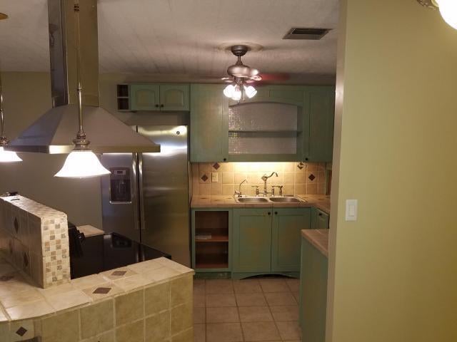 Photo of 5725 FERNLEY Drive E #7, West Palm Beach, FL 33415 (MLS # B26067913)