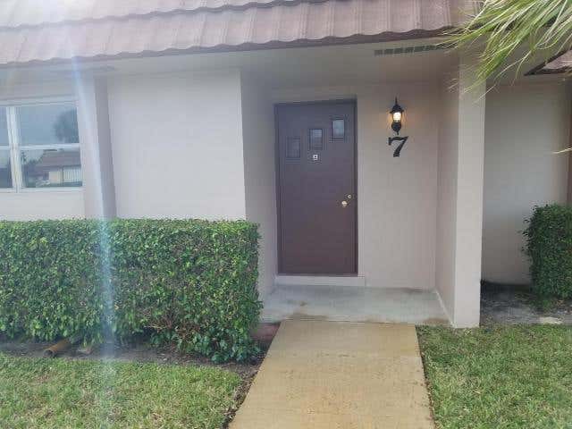 Photo of 5725 FERNLEY Drive E #7, West Palm Beach, FL 33415 (MLS # B26067913)