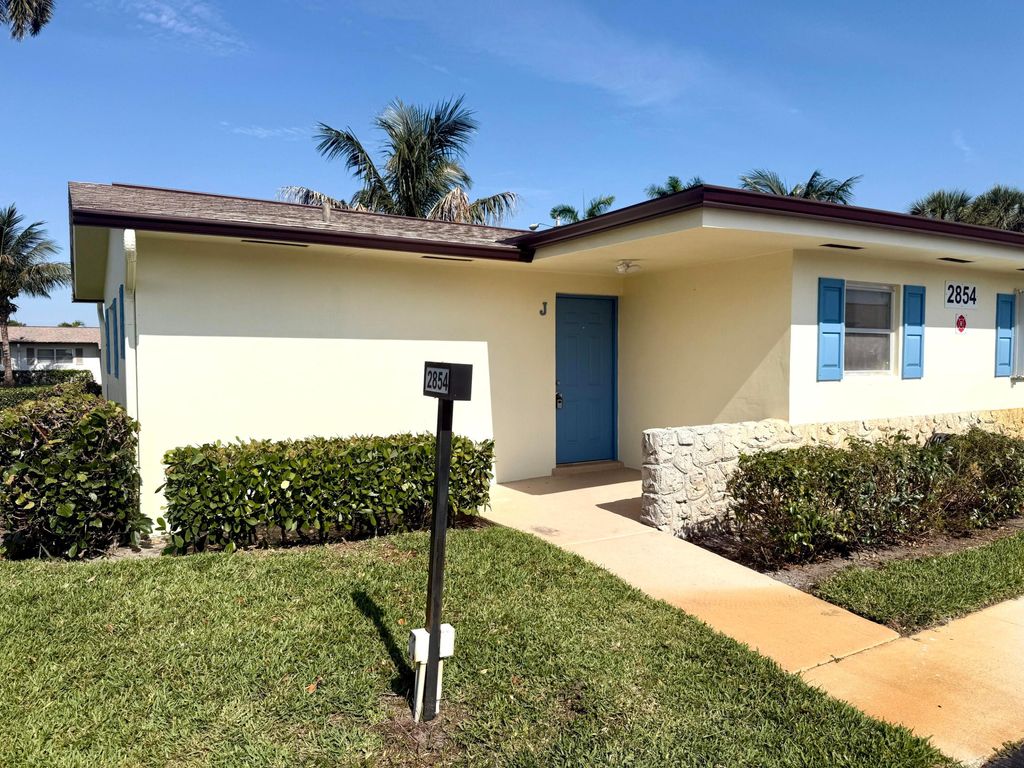 Photo of 2854 E Crosley Dr Drive E #J, West Palm Beach, FL 33415 (MLS # B26023684)