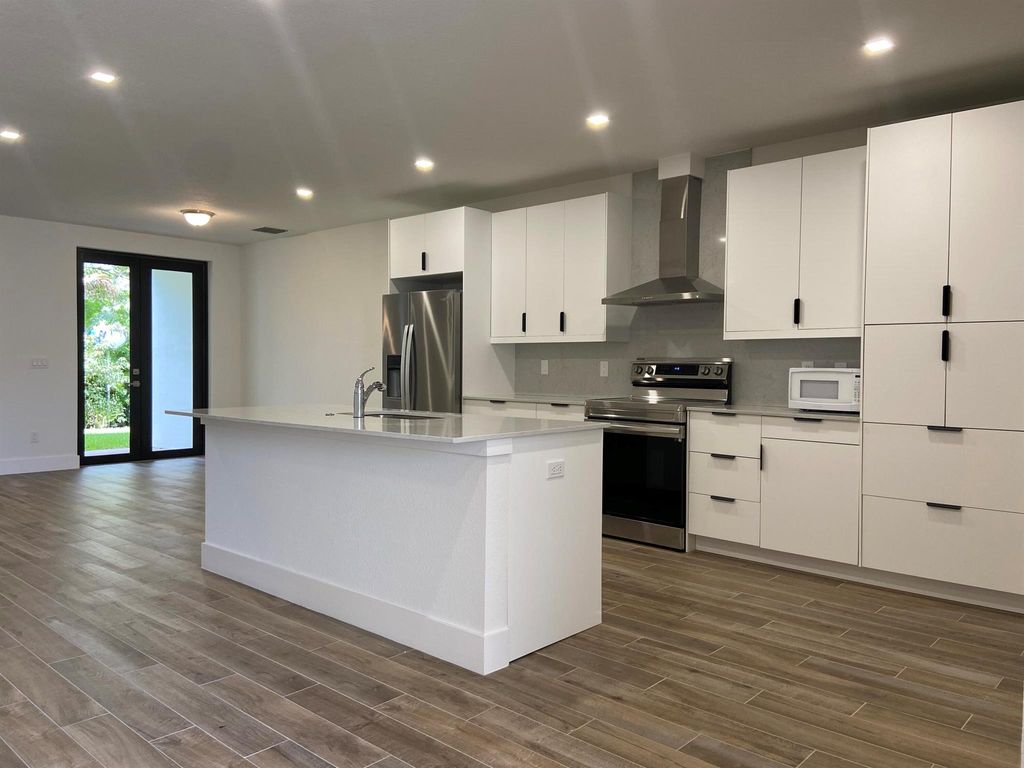 Photo of 365 Bella Sol Way, West Palm Beach, FL 33406 (MLS # R10963307)