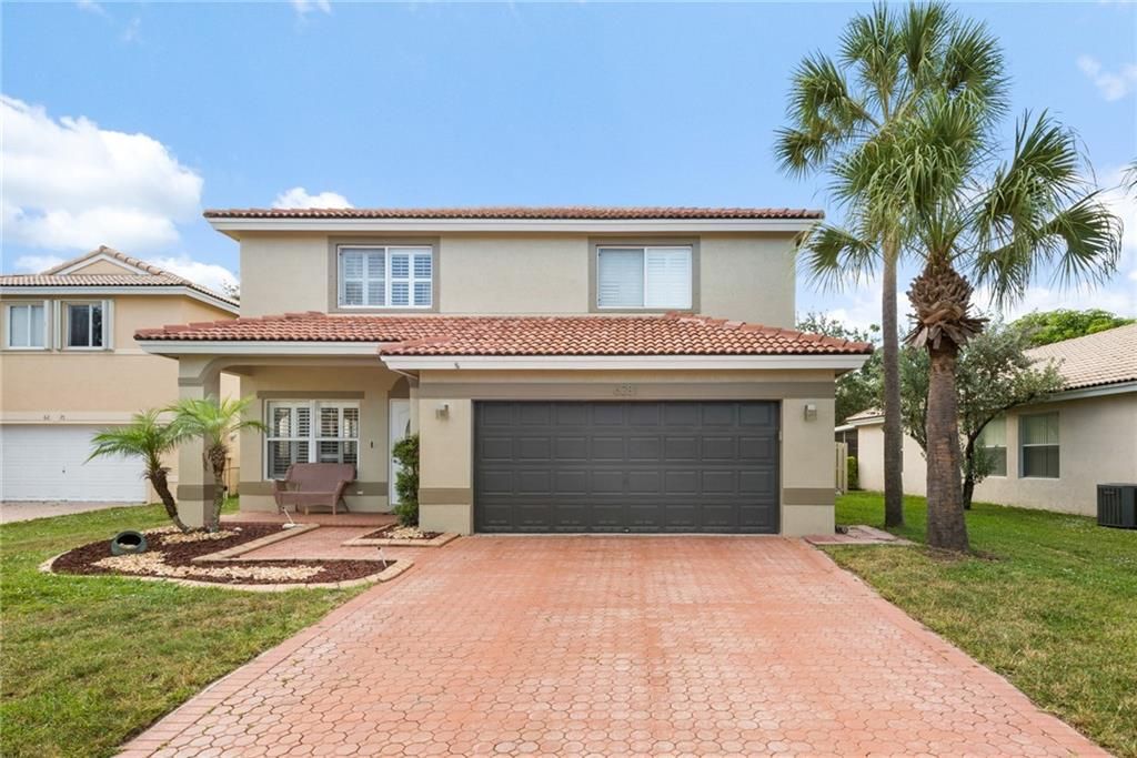 Photo of 6281 NW 41st Terrace, Coconut Creek, FL 33073 (MLS # F10281074)