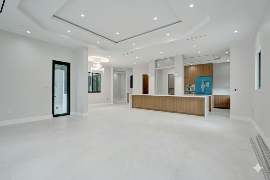 This exquisite New Construction home offers seven bedrooms plus an office, eight bathrooms, and 8,247 sq. ft. of refined living space. Walking through the custom 11-foot front door, you are met with direct views of the pool and a sense of spaciousness with 24 feet of ceiling height. There is a wine room just off the formal dining area and an elevator as you come in through the garage. Three upstairs rooms boast private balconies with serene backyard views. The primary suite is a true retreat, complete with double walk-in closets, a cozy sitting area, a huge master bath, and direct pool access. Other features include an air-conditioned garage, a complete summer kitchen, and a full cabana bath. Centrally located in Plantation Acres.