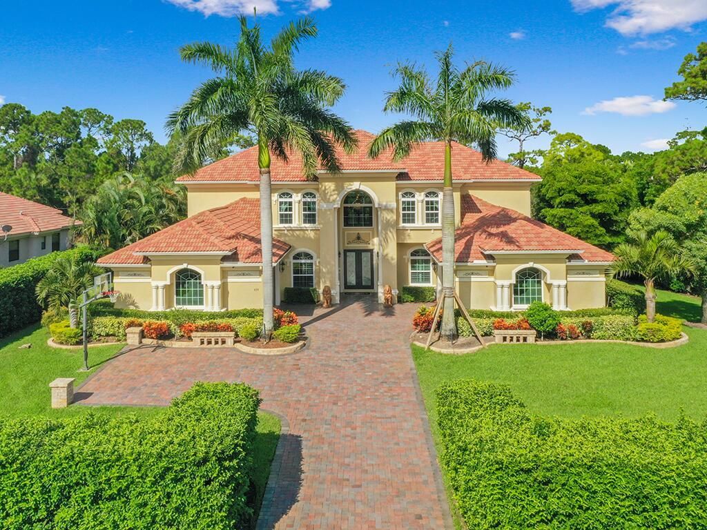 Photo of 679 SW Squire Johns Lane, Palm City, FL 34990 (MLS # R10746572)