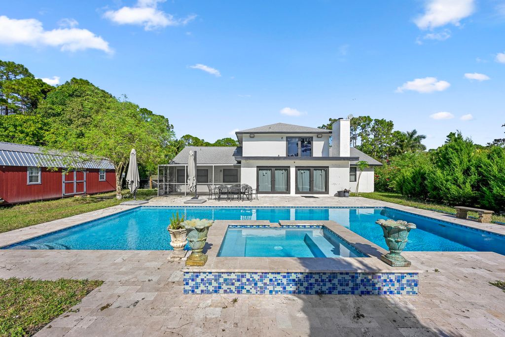 Photo of 16780 Temple Boulevard, The Acreage, FL 33470 (MLS # R11145361)