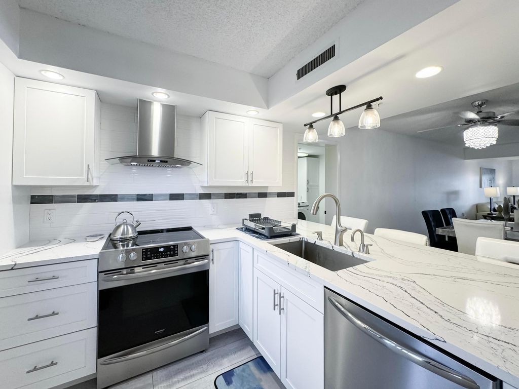 Photo of 1001 Seafarer Circle #102, Jupiter, FL 33477 (MLS # R11031481)