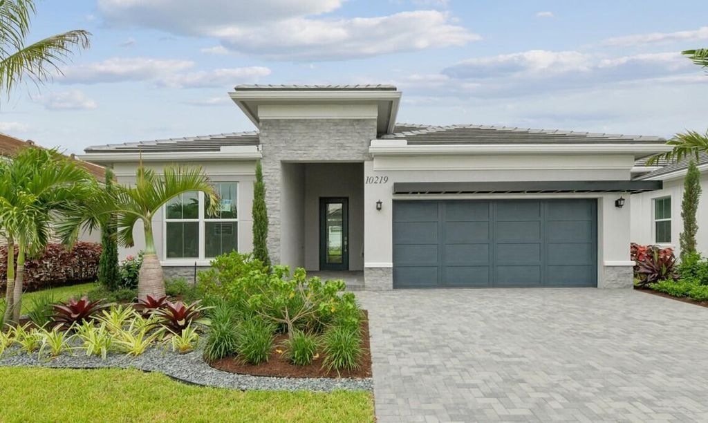 Photo of 10219 Timber Creek Way, Palm Beach Gardens, FL 33412 (MLS # B26035238)