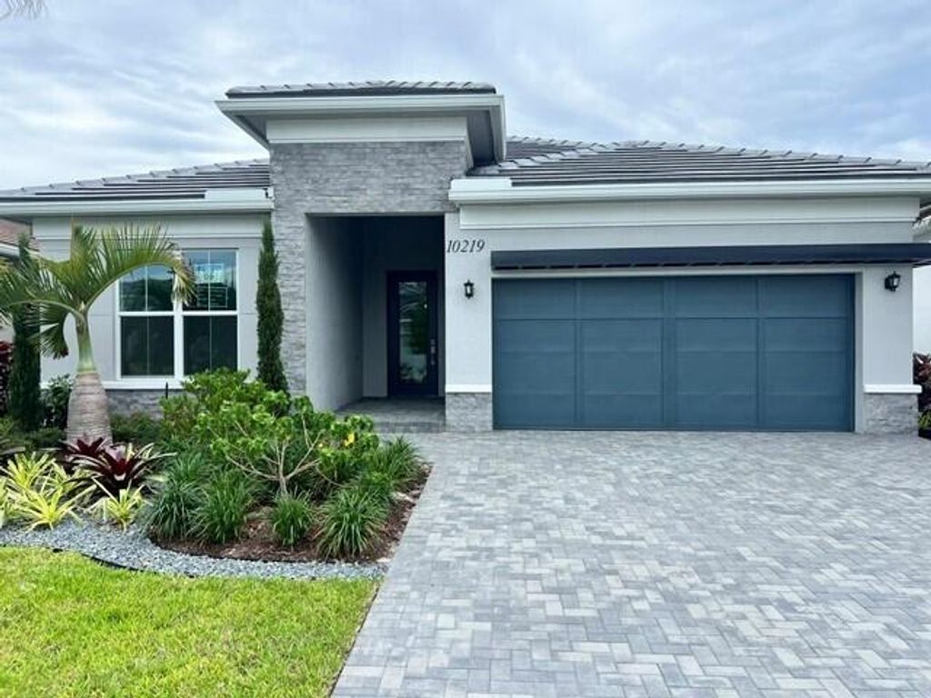 Photo of 10219 Timber Creek Way, Palm Beach Gardens, FL 33412 (MLS # B26035238)