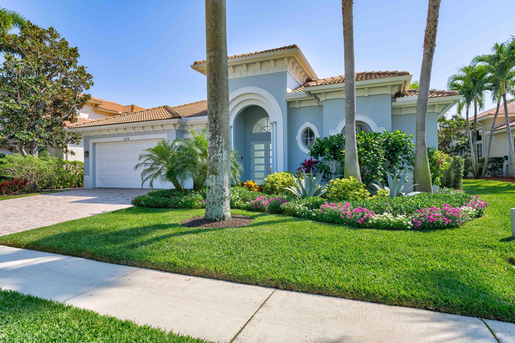 Discover paradise at 232 Montant Drive in Palm Beach Gardens' prestigious Frenchman's Reserve community. This private, gated haven offers refined living with world-class amenities.This splendid 4-bedroom residence welcomes you with timeless elegance and spacious living areas, including a custom-built fireplace in the formal living room. The updated kitchen boasts new appliances and custom cabinetry, enhancing both style and functionality. California Closets adorn the pantry and garage, optimizing organization.Step onto honed travertine floors that exude durability and beauty with an open floor plan that flows nicely from room to room. With 3.5 baths, including the adjacent casita featuring a full bedroom, bath, and bar area, entertaining guests is a breeze.