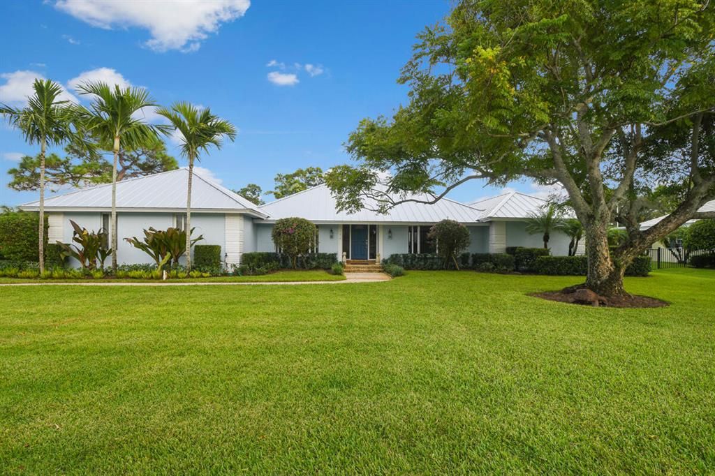 Photo of 112 SE Turtle Creek Drive, Tequesta, FL 33469 (MLS # R10743835)