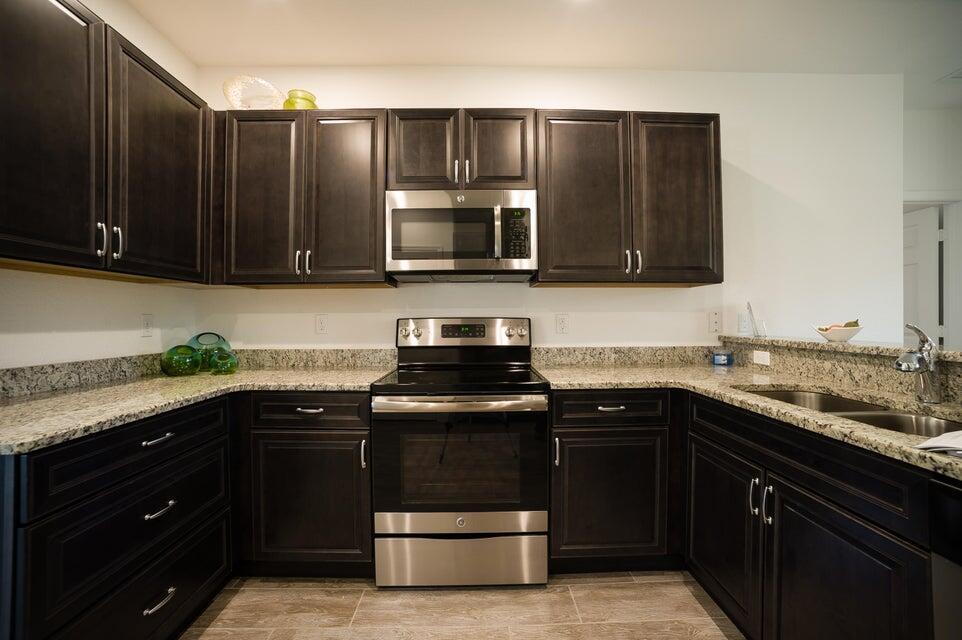 Bright & Eco Friendly Corner Villa in Port Saint Lucie. Welcome to this beautifully designed 2 bedroom 2 bath corner villa. This isn't average townhome ever detail was built with quality and care. You'll love the impact windows, spray foam insulation, and solar panels that make this home not only energy efficient but also easy on your monthly bills. Tucked in a peaceful community just minutes from shopping, dining, and major highways, this home offers the best of both worlds' convenience and quiet. Whether you're starting fresh , downsizing, or just ready for something movie-in ready and low maintenance, this villa is the one you'll want to call home.