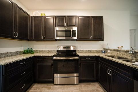 Photo of 758 NE Hawks Ridge Way, Port St Lucie, FL 34983 (MLS # R11136347) Photo of 758 NE Hawks Ridge Way, Port St Lucie, FL 34983 (MLS # R11136347)