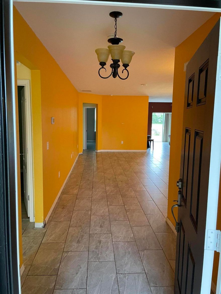 Welcome to your new home. Beautiful 4/2 Single Family home in the heart of Port St Lucie. UPDATED TILE THROUGH OUT ALL 4 BEDROOMS. Large walk in closet in master bedrooms. Shower conveniently located between 2 bedrooms. Large kitchen with island. Go see this house for youself. You will be amaze. Bring all offers.