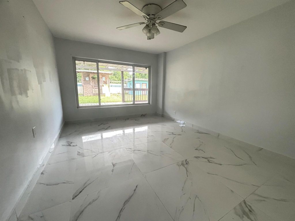 Photo of 324 SE Tressler Drive, Stuart, FL 34994 (MLS # R10997913)