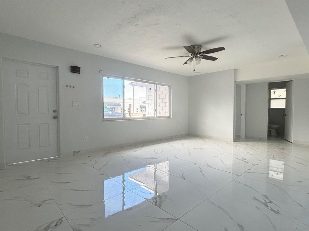 Photo of 324 SE Tressler Drive, Stuart, FL 34994 (MLS # R10997913)