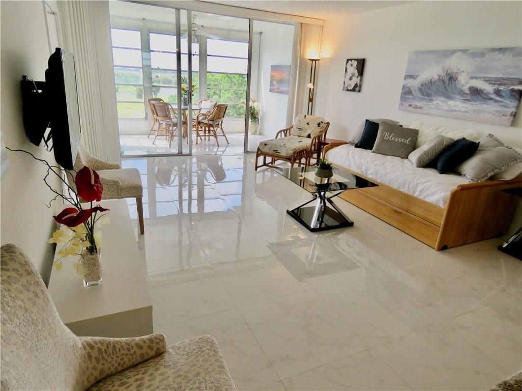 Photo of 3080 N Course Dr #706, Pompano Beach, FL 33069 (MLS # F10300259)