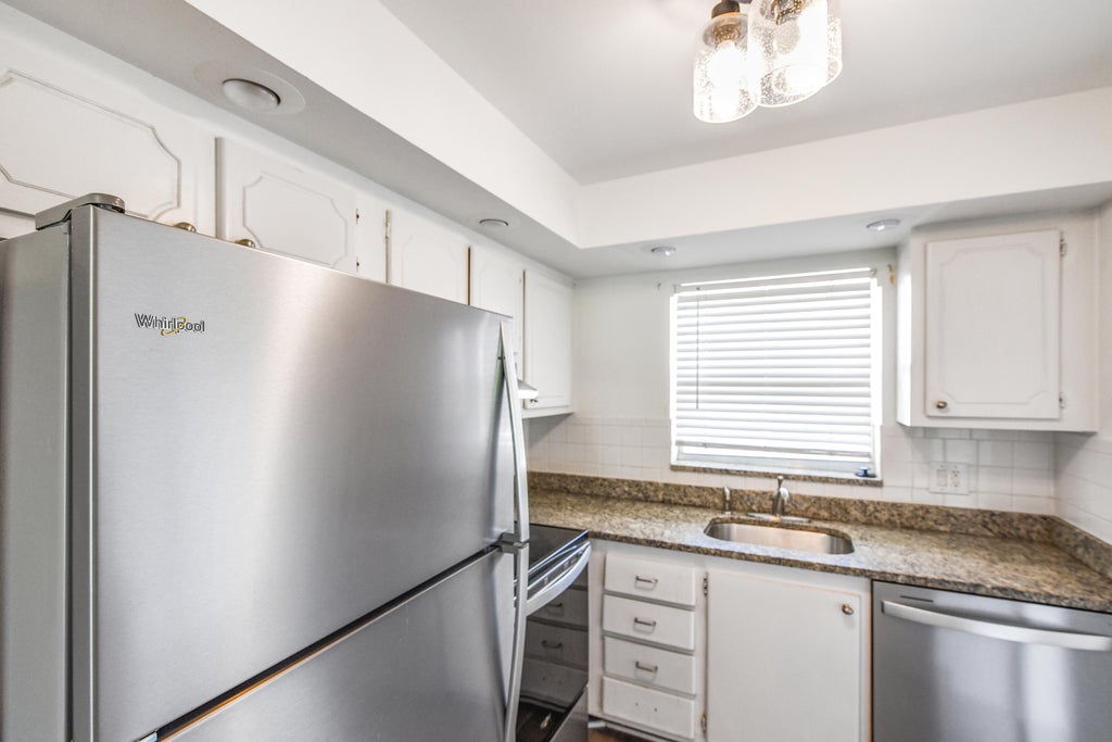 Photo of 9851 Sandalfoot Boulevard #210, Boca Raton, FL 33428 (MLS # B26073180)